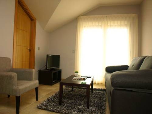 Imagen de la habitación del Apartamentos Turísticos Playa de Tapia. Foto 7