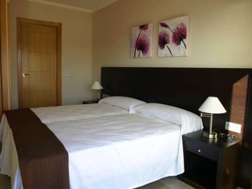 Imagen de la habitación del Apartamentos Turísticos Playa de Tapia. Foto 8