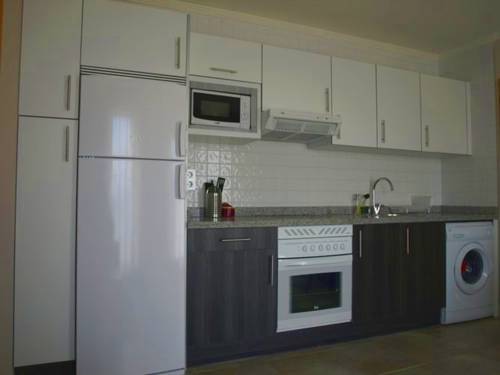 Imagen de la habitación del Apartamentos Turísticos Playa de Tapia. Foto 9