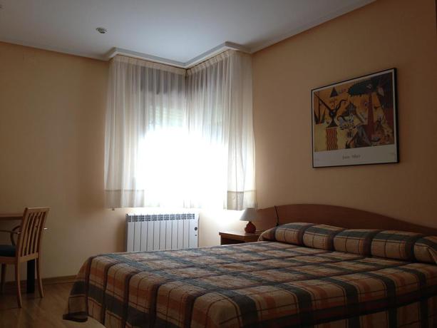 Imagen de la habitación del Apartamentos Turísticos Puerta De León. Foto 2