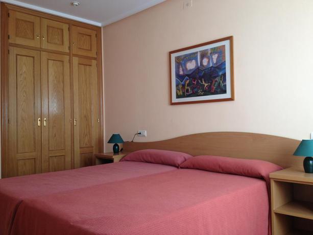 Imagen de la habitación del Apartamentos Turísticos Puerta De León. Foto 12