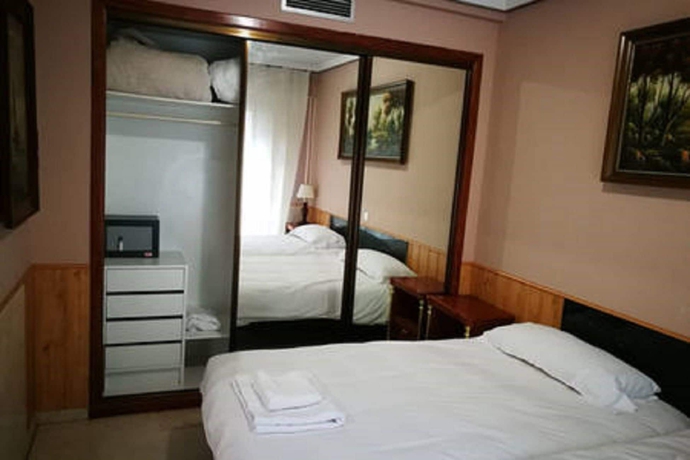 Imagen de la habitación del Apartamentos Turísticos Torr. Foto 5