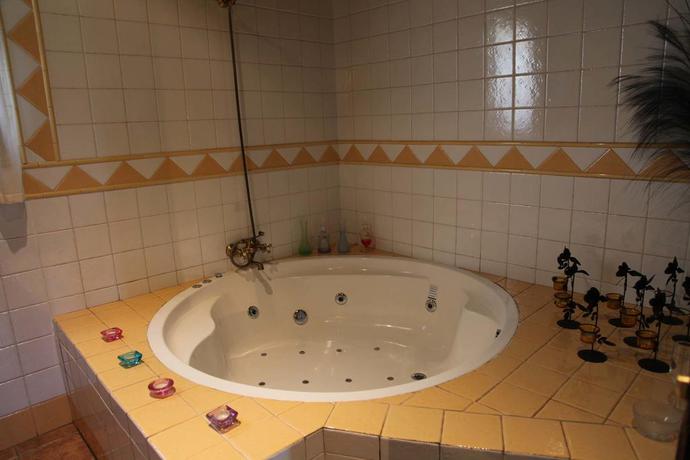 Imagen de la habitación del Apartamentos Turismo Rural y SPA El Cercado. Foto 11