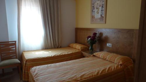 Imagen de la habitación del Apartamentos Turisticos Las Yucas. Foto 8