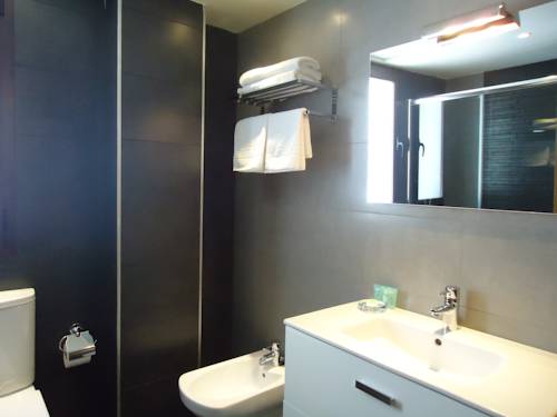 Imagen de la habitación del Apartamentos Turisticos Mauror. Foto 8