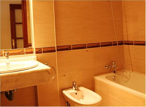 Imagen de la habitación del Apartamentos Turisticos Puerta Nueva. Foto 4