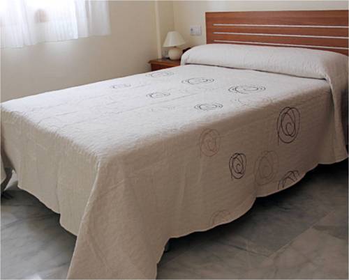 Imagen de la habitación del Apartamentos Turisticos Puerta Nueva. Foto 6