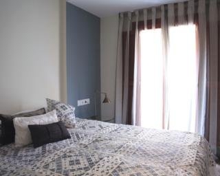 Imagen de la habitación del Apartamentos Uma Suites Barceloneta Beach. Foto 11