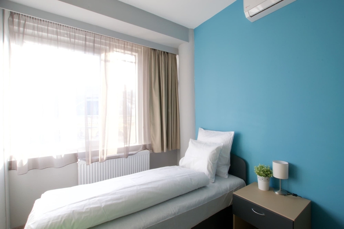 Imagen de la habitación del Apartamentos United Colors Of Budapest. Foto 12