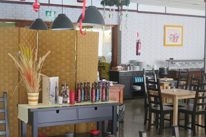 Imagen del bar/restaurante del Apartamentos Ura Jardín Del Atlántico. Foto 7