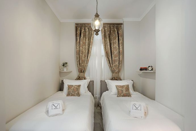 Imagen de la habitación del Apartamentos V1935 Luxurious. Foto 16