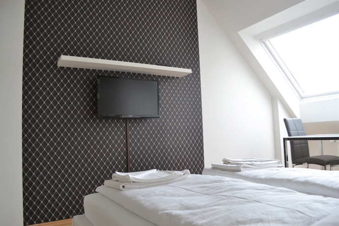 Imagen de la habitación del Apartamentos Vienna Inn. Foto 2