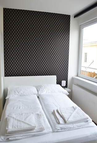 Imagen de la habitación del Apartamentos Vienna Inn. Foto 4