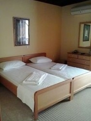 Imagen de la habitación del Apartamentos Villa Pinotsi. Foto 9
