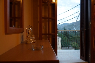 Imagen de la habitación del Apartamentos Villa Pinotsi. Foto 12