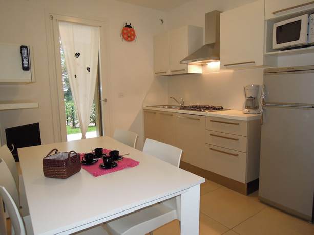 Imagen de la habitación del Apartamentos Villaggio Evanike. Foto 3