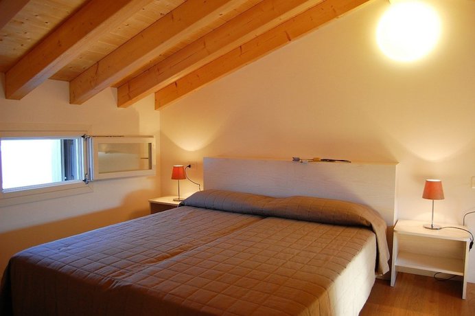 Imagen de la habitación del Apartamentos Villaggio Evanike. Foto 4