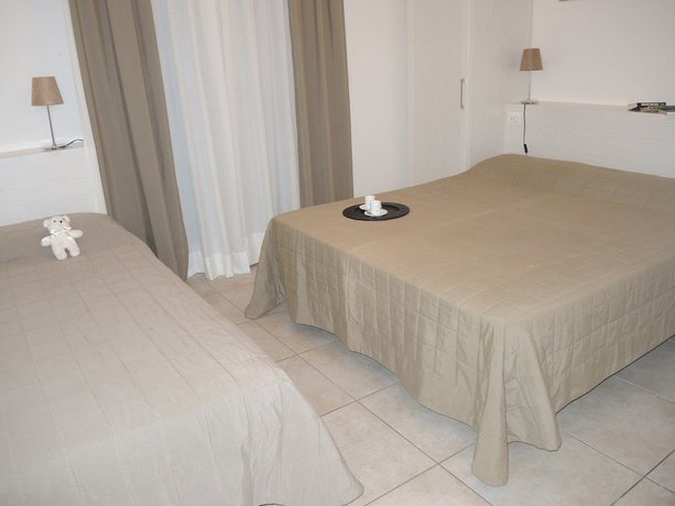 Imagen de la habitación del Apartamentos Villaggio Evanike. Foto 5