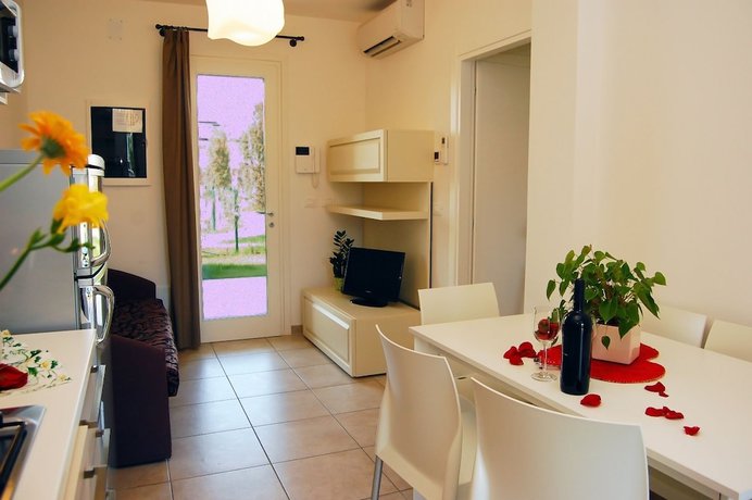 Imagen de la habitación del Apartamentos Villaggio Evanike. Foto 6