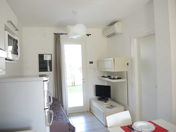 Imagen de la habitación del Apartamentos Villaggio Evanike. Foto 7
