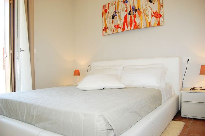 Imagen de la habitación del Apartamentos Villaggio Evanike. Foto 11