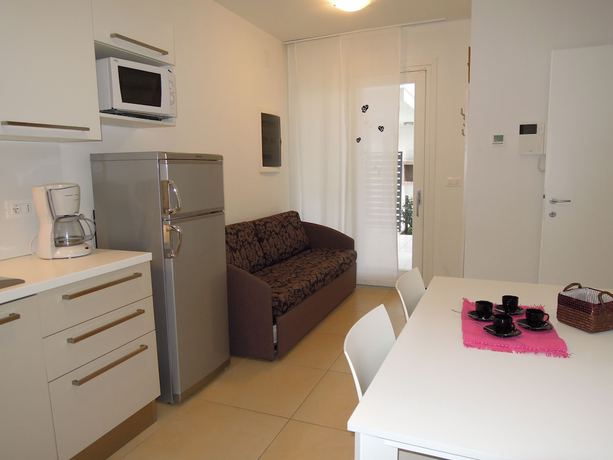 Imagen de la habitación del Apartamentos Villaggio Evanike. Foto 14