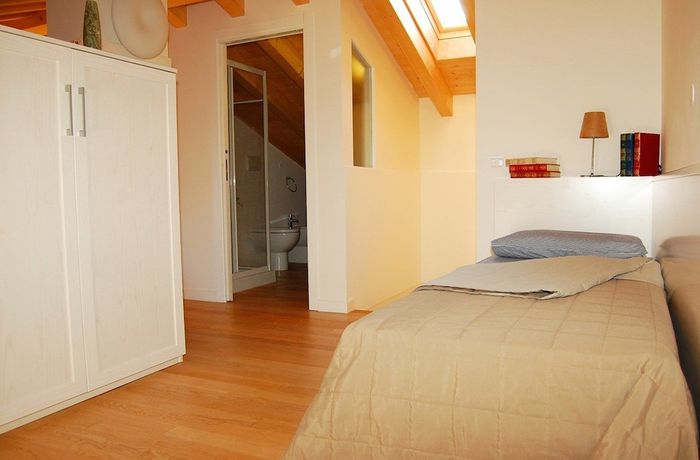 Imagen de la habitación del Apartamentos Villaggio Evanike. Foto 15