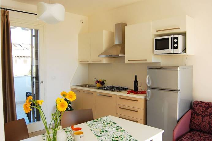 Imagen de la habitación del Apartamentos Villaggio Evanike. Foto 17
