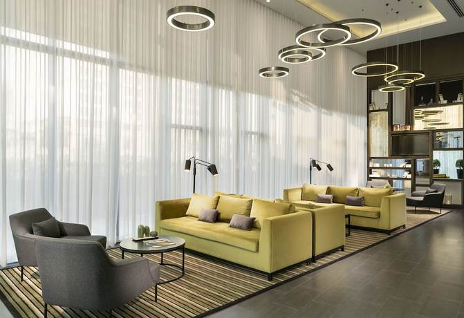 Imagen del bar/restaurante del Apartamentos Westside Residences By Rotana. Foto 2