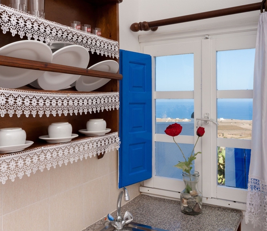 Imagen de la habitación del Apartamentos White Cave Villas. Foto 5