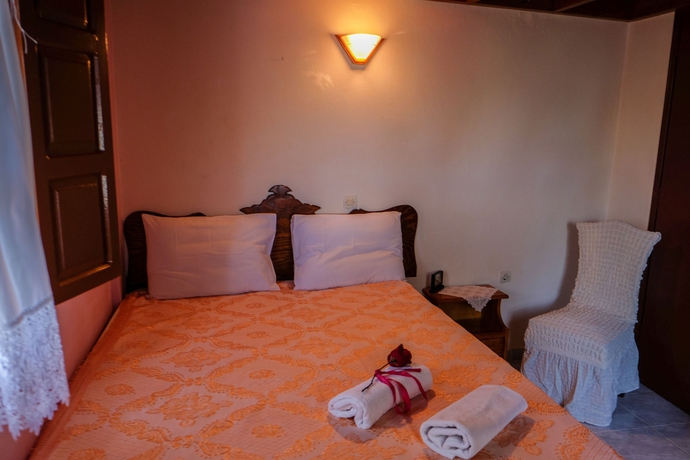 Imagen de la habitación del Apartamentos White Cave Villas. Foto 7