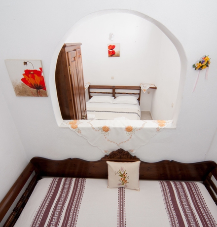 Imagen de la habitación del Apartamentos White Cave Villas. Foto 8