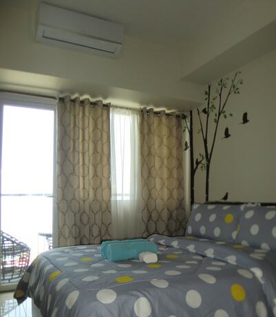 Imagen de la habitación del Apartamentos Wind Residences by SMCo. Foto 13