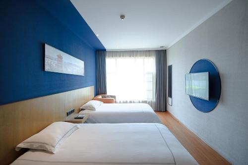 Imagen de la habitación del Apartamentos Wuhan Life Serviced. Foto 8