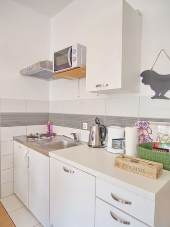 Imagen de la habitación del Apartamentos Xandy. Foto 20