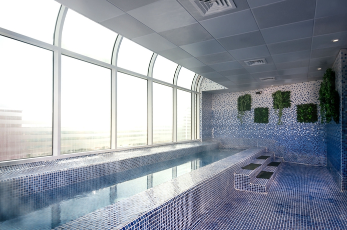 Imagen de la piscina del Apartamentos Ziqoo Hotel Apartments. Foto 16