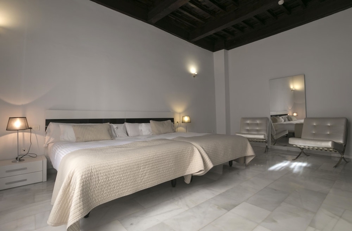 Imagen de la habitación del Apartamentos tuGuest Elvira Suite. Foto 10