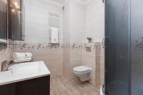 Imagen de la habitación del Apartamentos świnoujście center. Foto 14