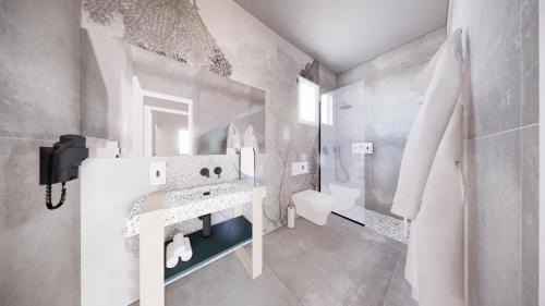 Imagen de la habitación del Aparthotel 001 Higos Beach Boutique Singular Residence. Foto 10
