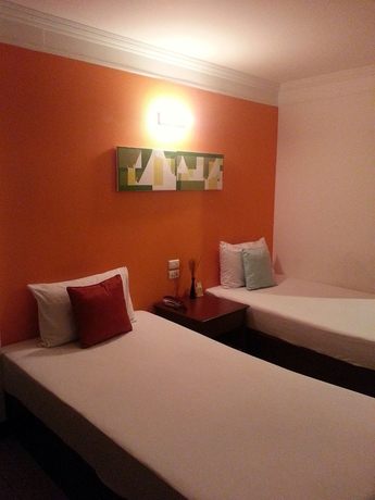 Imagen de la habitación del Aparthotel 128 Room and Massage. Foto 7