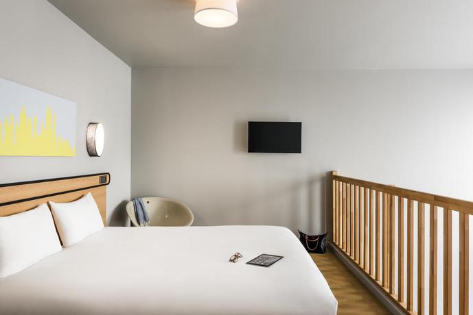 Imagen de la habitación del Aparthotel ADAGIO ACCESS LA DEFENSE COLOMBES. Foto 6