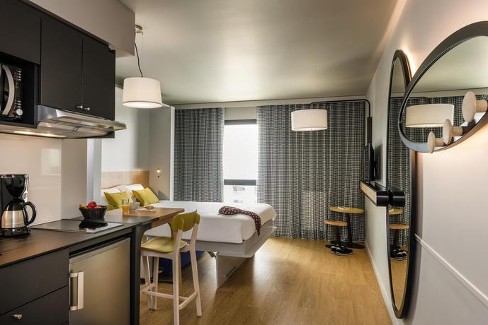 Imagen de la habitación del Aparthotel ADAGIO ACCESS LA DEFENSE COLOMBES. Foto 8