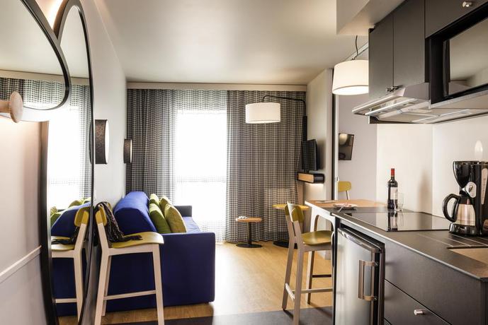 Imagen de la habitación del Aparthotel ADAGIO ACCESS LA DEFENSE COLOMBES. Foto 11