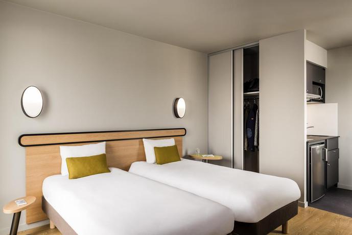 Imagen de la habitación del Aparthotel ADAGIO ACCESS LA DEFENSE COLOMBES. Foto 13