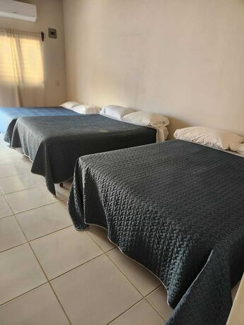 Imagen de la habitación del Aparthotel APARTA HOTEL PALMEROLA. Foto 11