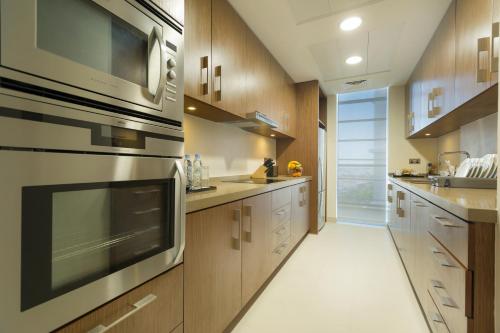 Imagen de la habitación del Aparthotel Adagio Abu Dhabi Al Bustan. Foto 10