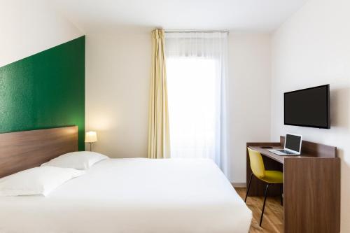Imagen de la habitación del Aparthotel Adagio Access Carri&egrave;res-sous-poissy. Foto 10