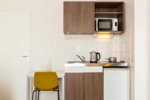 Imagen de la habitación del Aparthotel Adagio Access Carri&egrave;res-sous-poissy. Foto 11