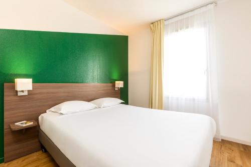 Imagen de la habitación del Aparthotel Adagio Access Carri&egrave;res-sous-poissy. Foto 12