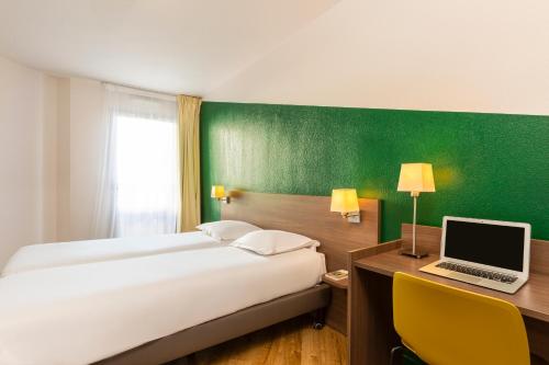 Imagen de la habitación del Aparthotel Adagio Access Carri&egrave;res-sous-poissy. Foto 17